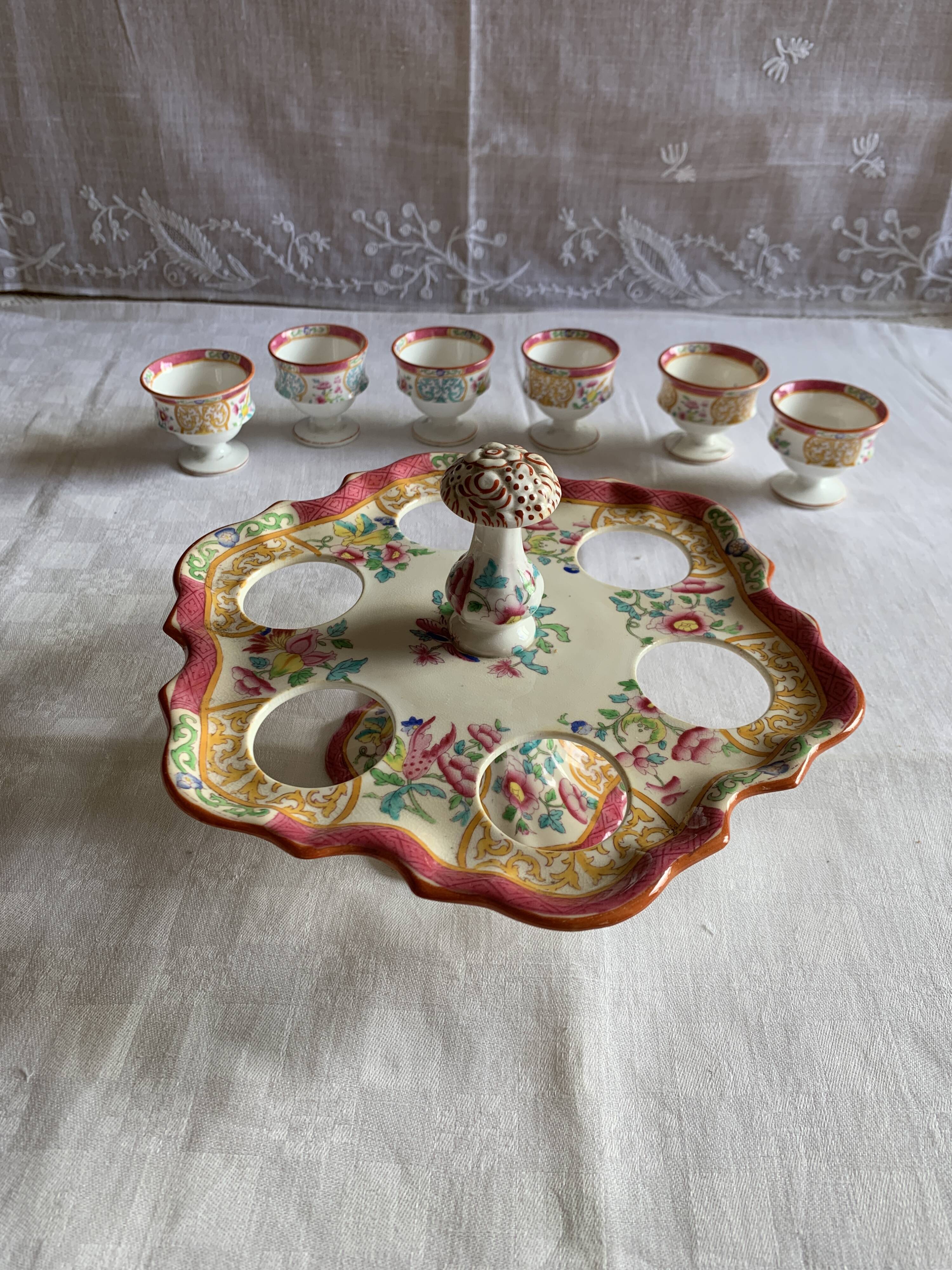 Minton egg cup holder and its 6 egg cups