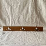 Vintage wooden wall-mounted coat rack with three double hooks