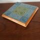 Vintage wooden and ceramic trivet