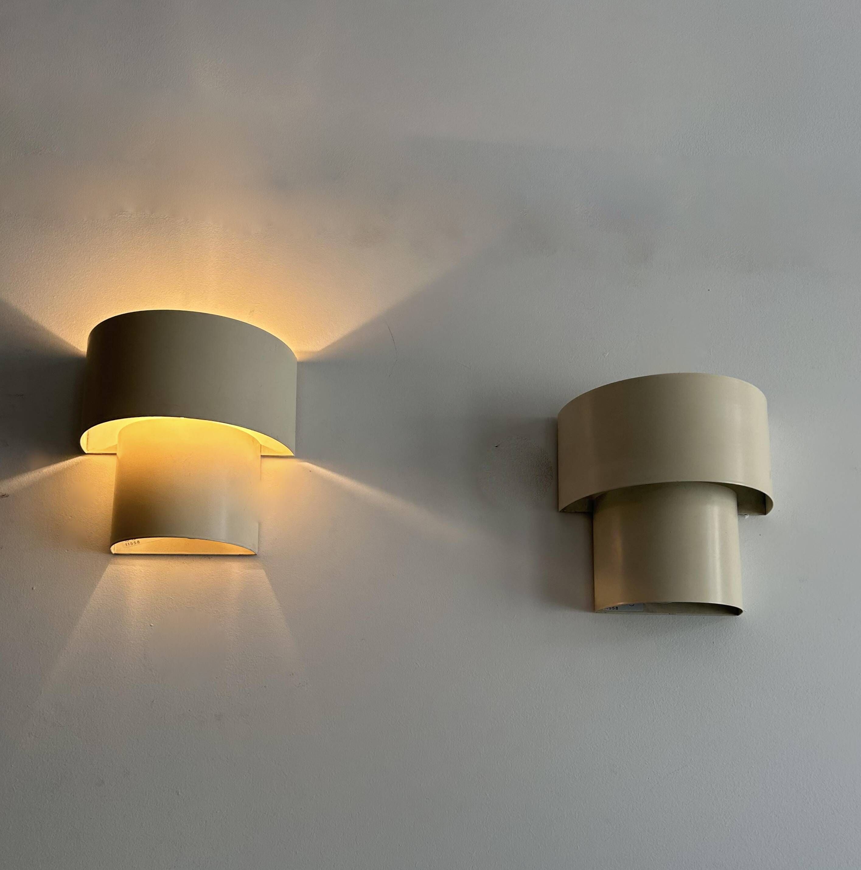 Pair of vintage modernist wall lights, white lacquered metal, Sweden 1970