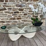 Trendy coffee table in glass and travertine
