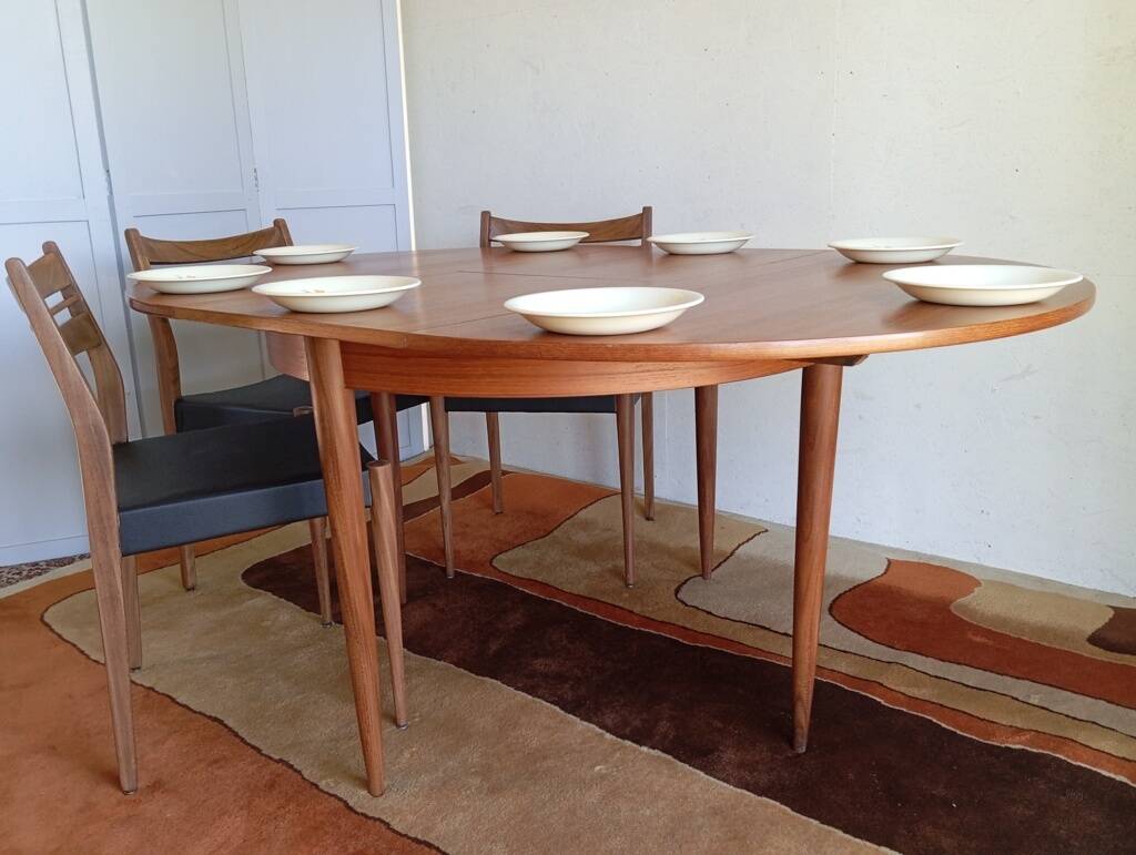 Scandinavian round extendable teak table