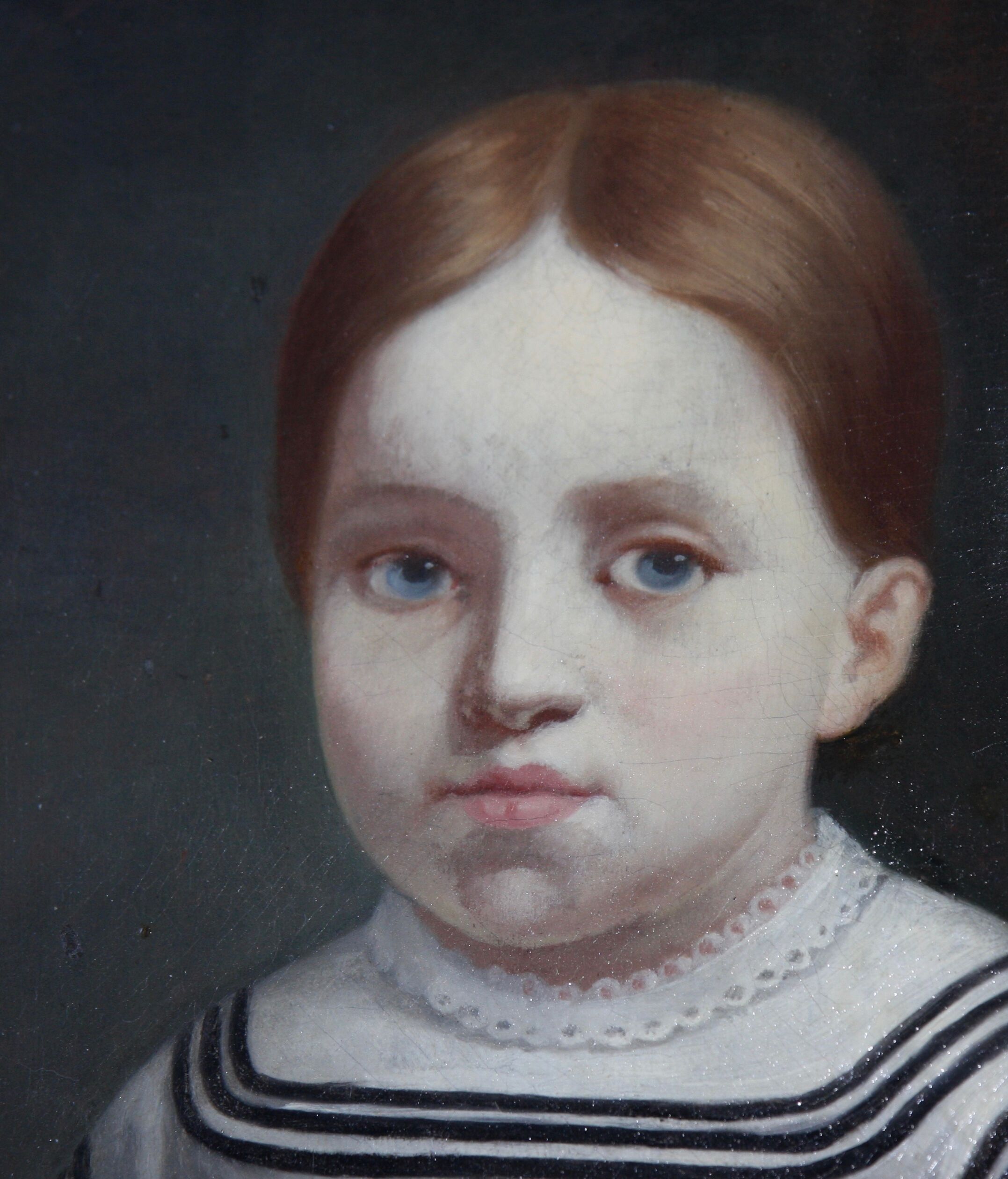Tableau ancien portrait de petite fille aux yeux bleus huile sur toile XIXe siècle.