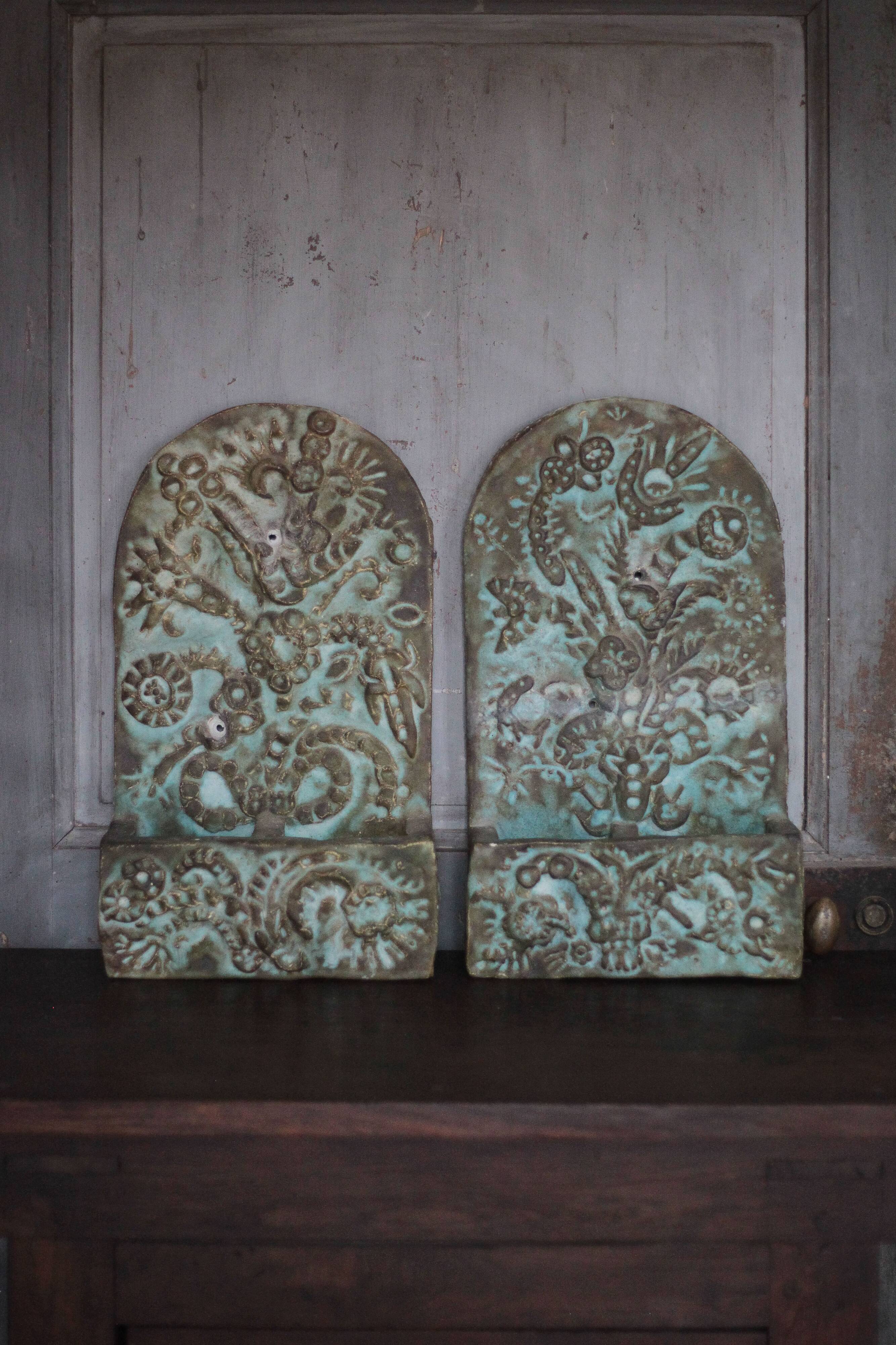 Pair of signed ceramic wall planters, pot cover