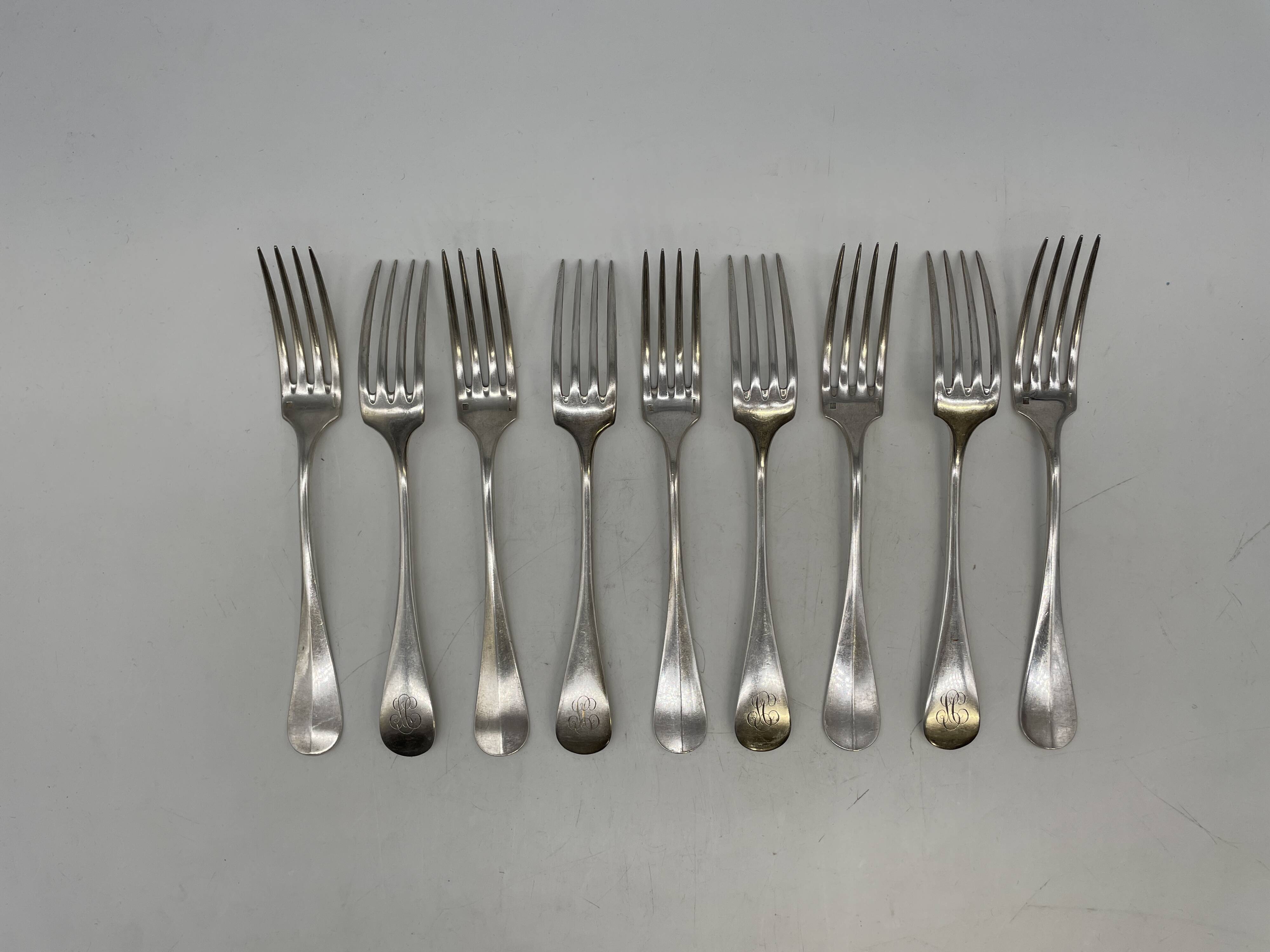 Set of 15 soup spoons and 9 lunch forks by Christofle.