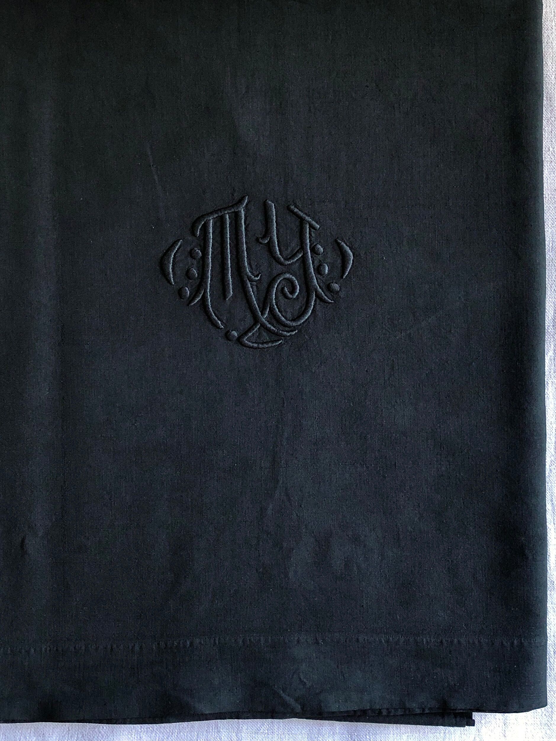Old sheet in pure washed linen tinted in charcoal black