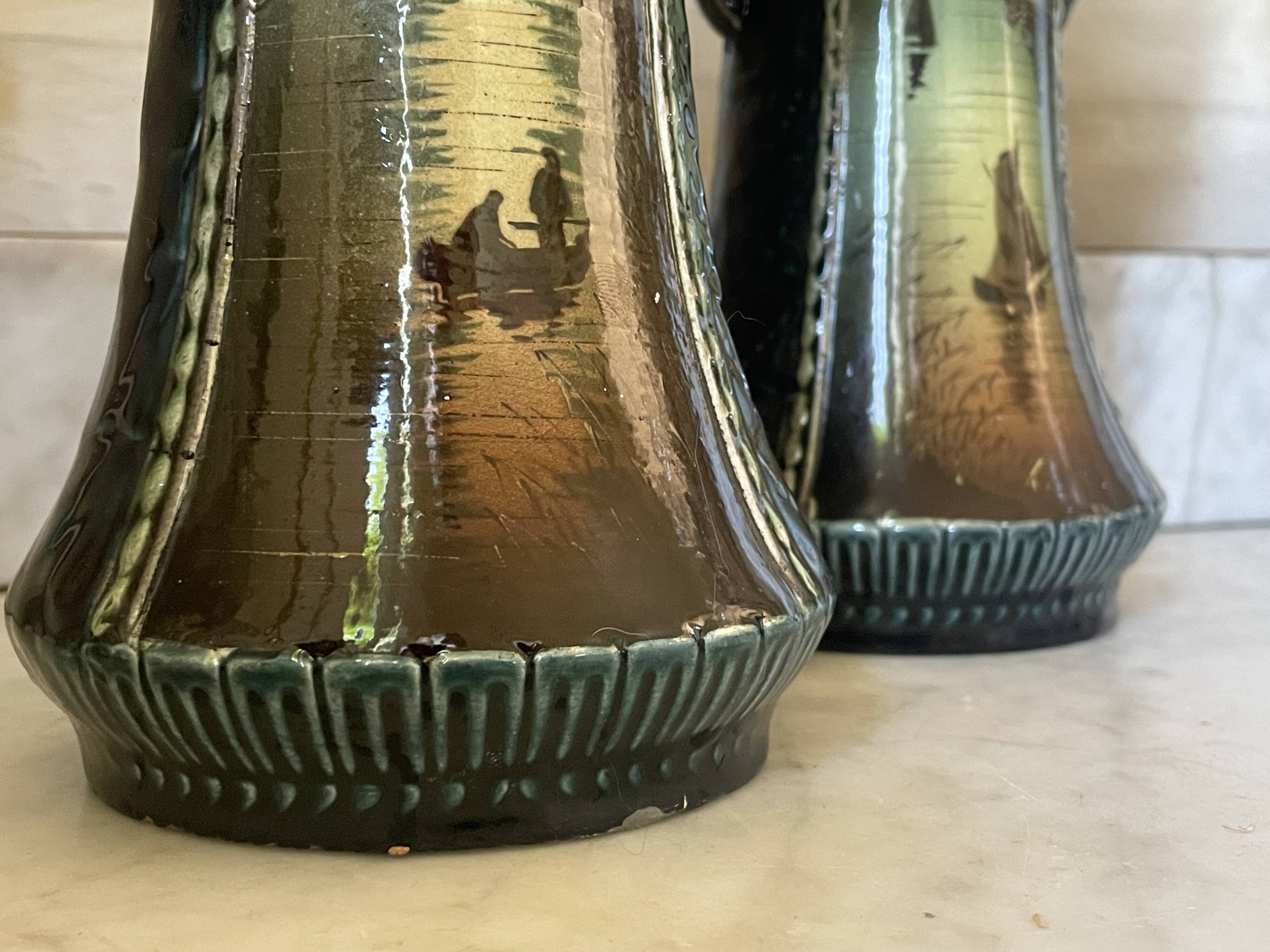 Pair of Art Nouveau slipware vases, hand-painted decoration.