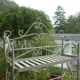 White wrought iron folding shelf