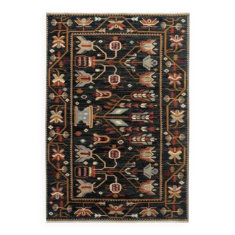 Black floral Persian carpet
