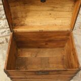 Ancient travel trunk, bulging wooden chest