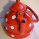 Vintage kettle in red enamelled sheet with white polka dots