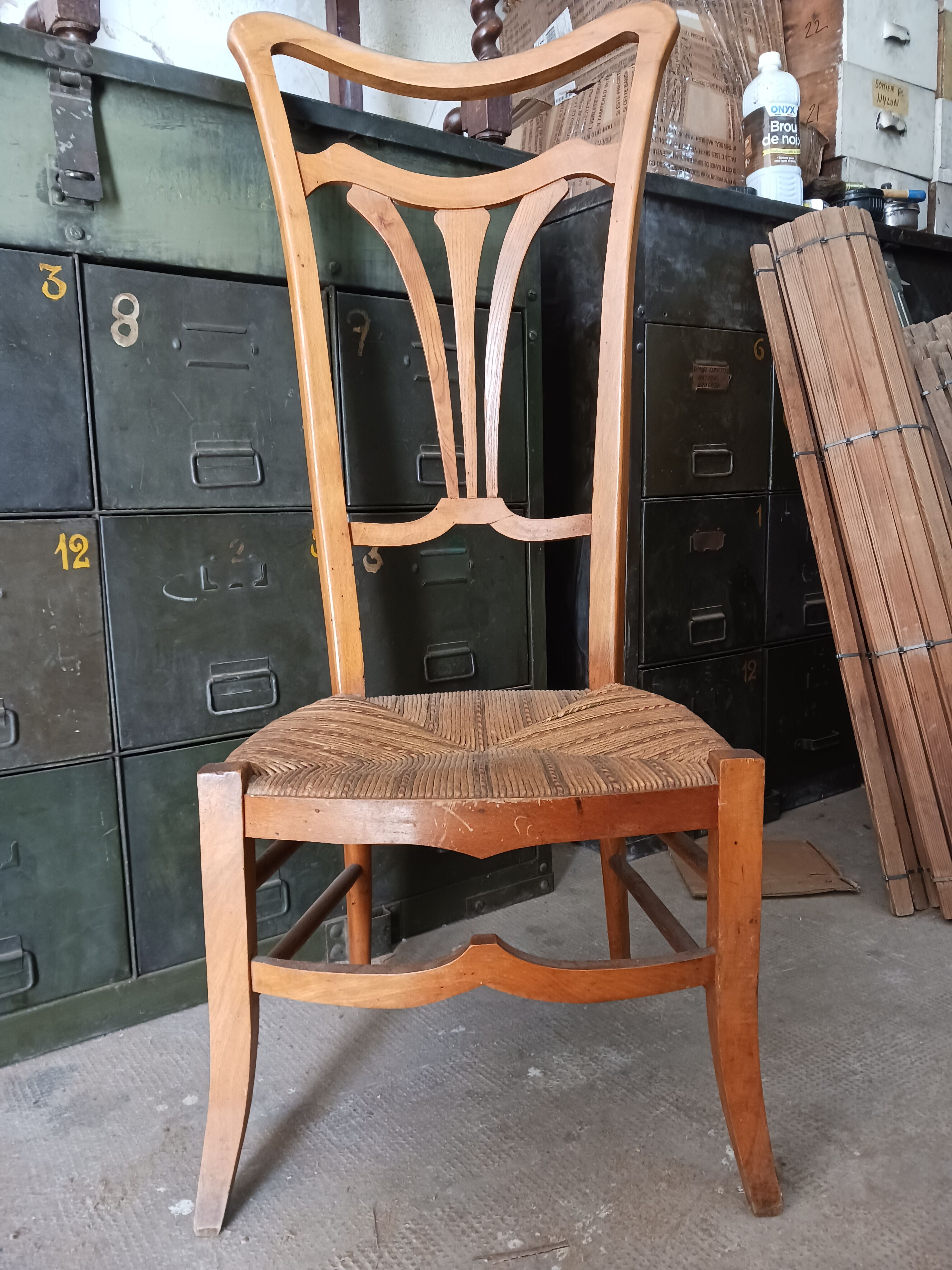 Low chair with high back, called nourishment period 1900, Art Nouveau