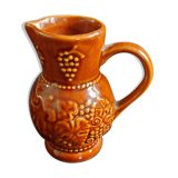 Glazed clay pitcher
