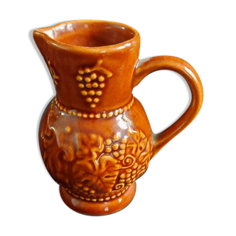 Glazed clay pitcher