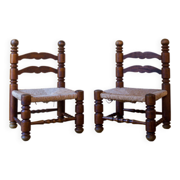Pair of low armchairs in turned wood and straw, in the style of C. Dudouyt.
