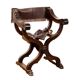 Antique neo-Renaissance folding chair in walnut and leather, Italy, 20th century.