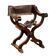 Antique neo-Renaissance folding chair in walnut and leather, Italy, 20th century.