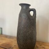 Black ceramic pitcher from the 50s