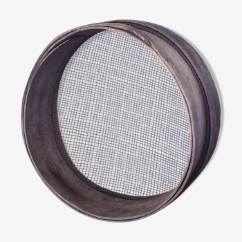 Old sieve of large diameter