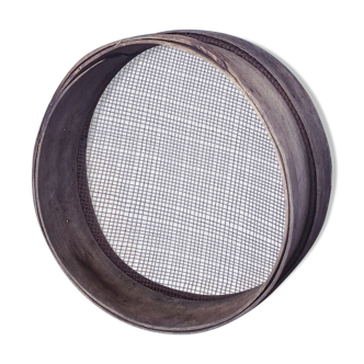 Old sieve of large diameter