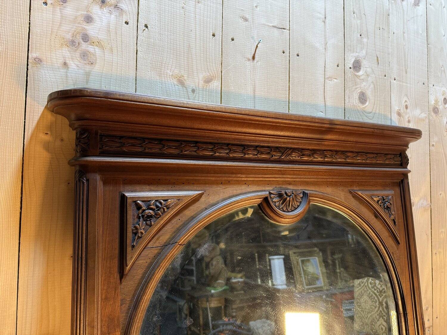 Large walnut mirror from the Art Deco period.