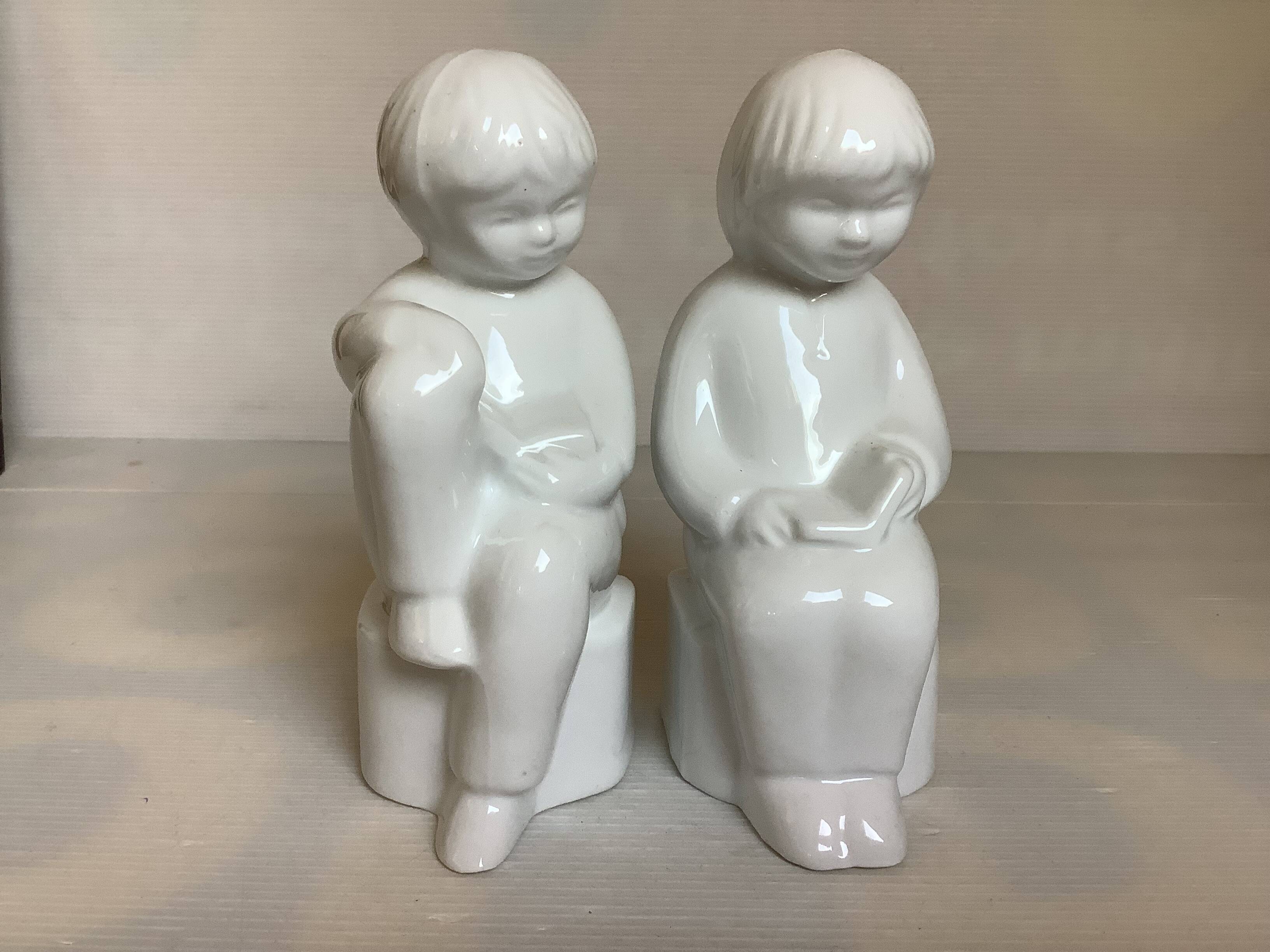 Pair of bookends featuring children reading from the 1970s.