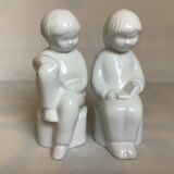 Pair of bookends featuring children reading from the 1970s.