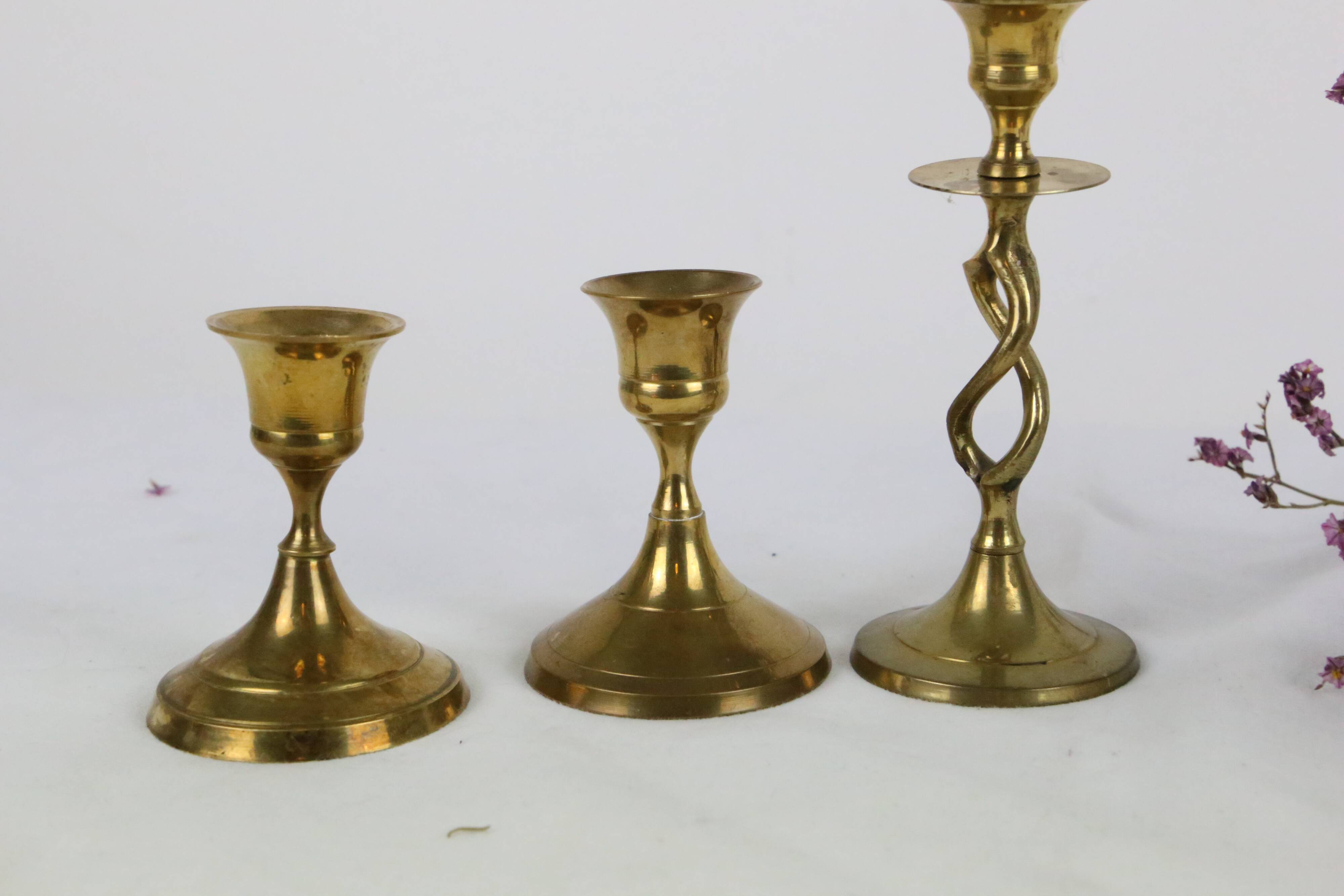 Trio of brass candle holders, vintage