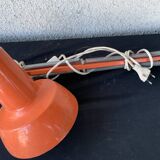 Orange articulated architect's lamp