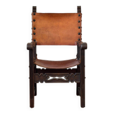 Frailero armchair, antique Spanish — carved wood & full-grain leather throne.