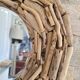 Very nice driftwood mirror.