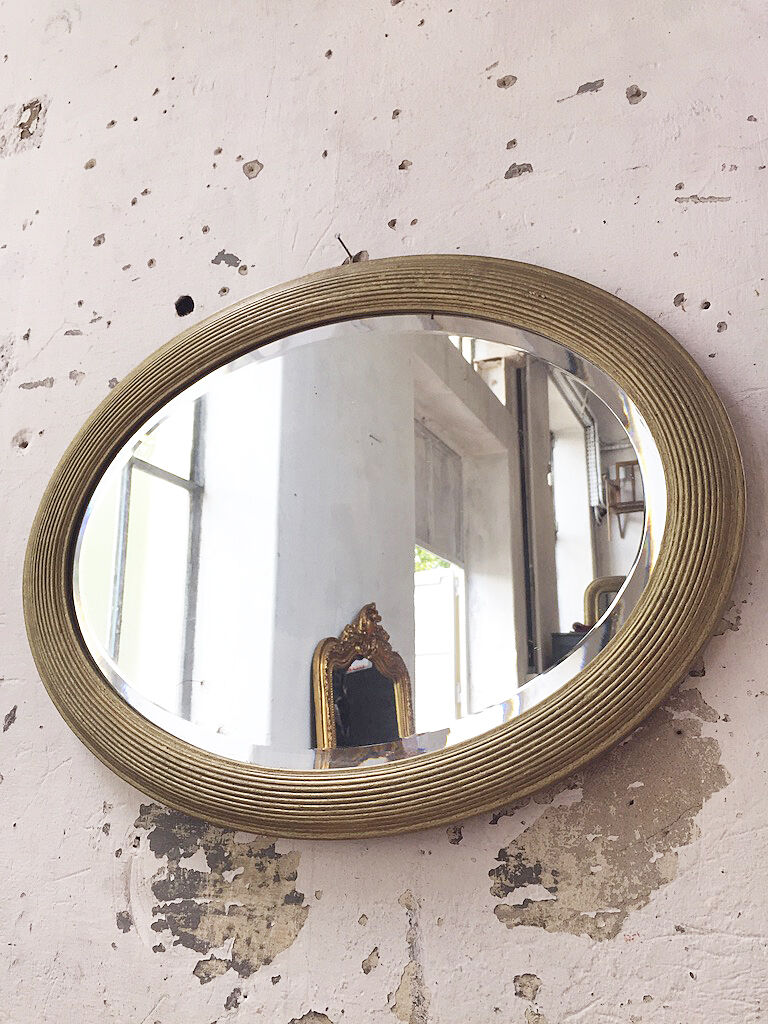 Napoleon oval mirror with 19th century cane