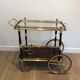 Rolling table in brass and mahogany with removable trays