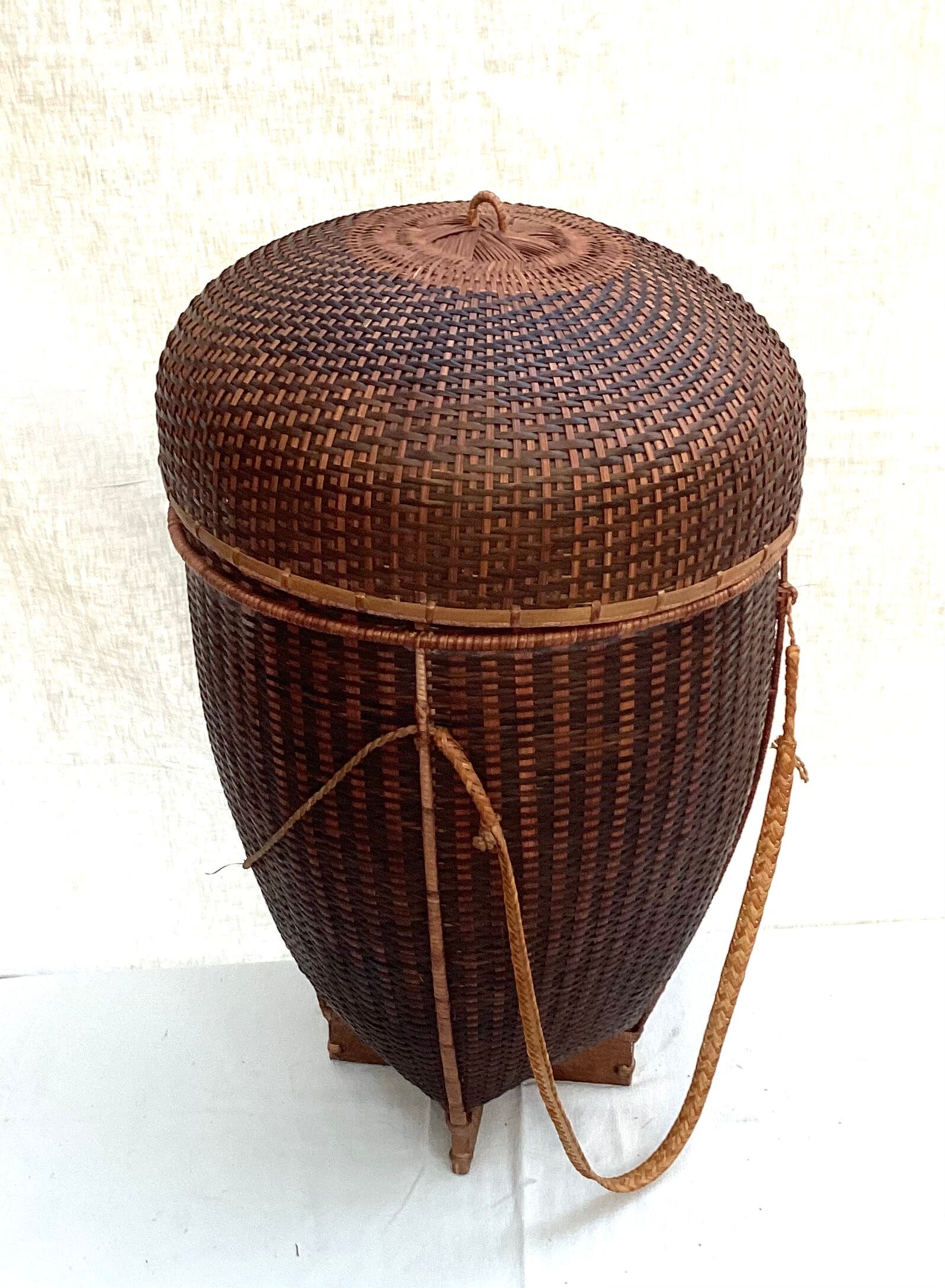 Set of four wicker baskets, rattan nesting ethnic style
