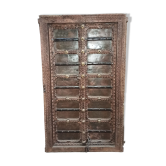 Old wooden door with frame