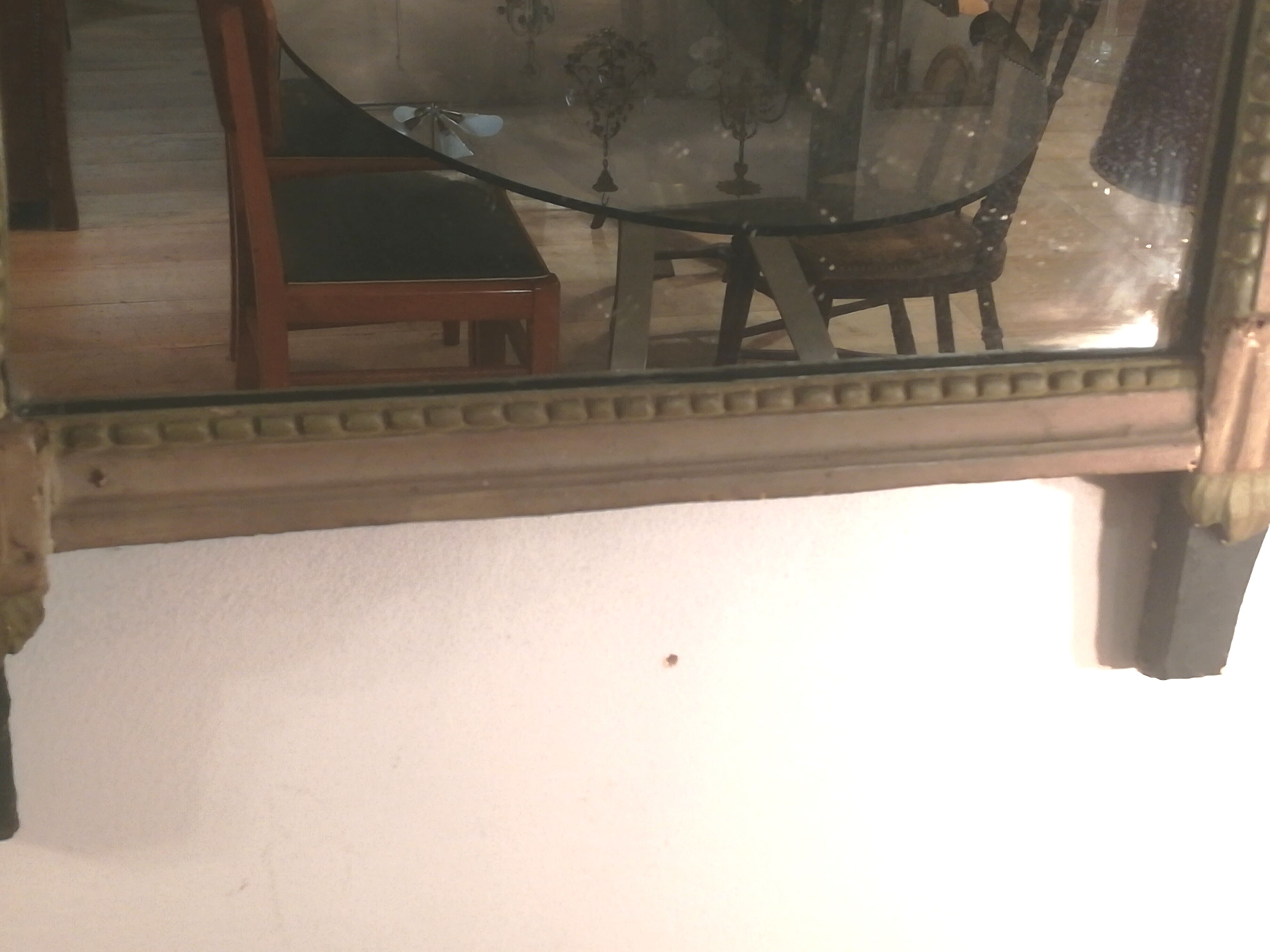 Louis XVI period mirror in patinated wood - 84x51cm