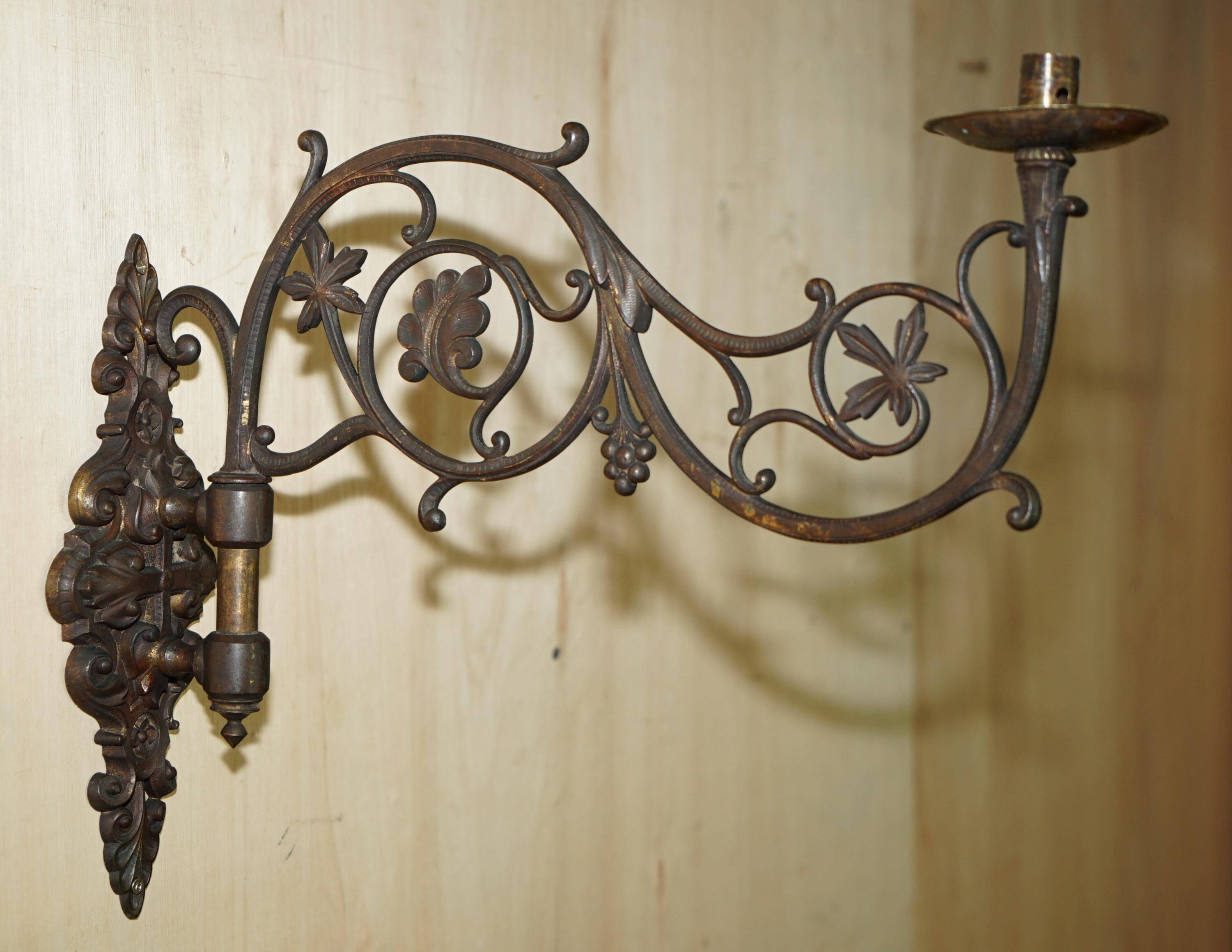 Pair of antique wall sconces in gilded bronze.