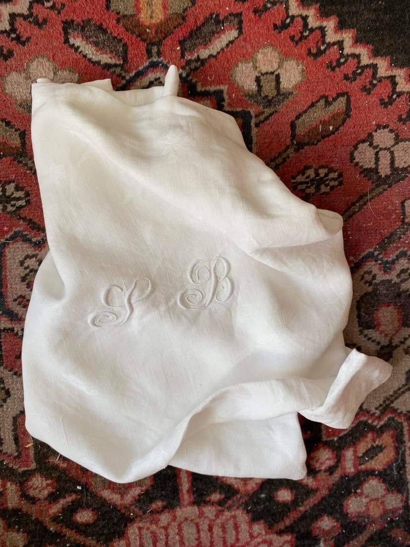 Old tablecloth in white cotton and monogram