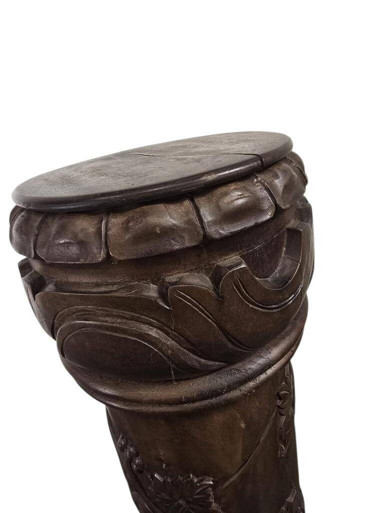 Vintage wooden column with carving