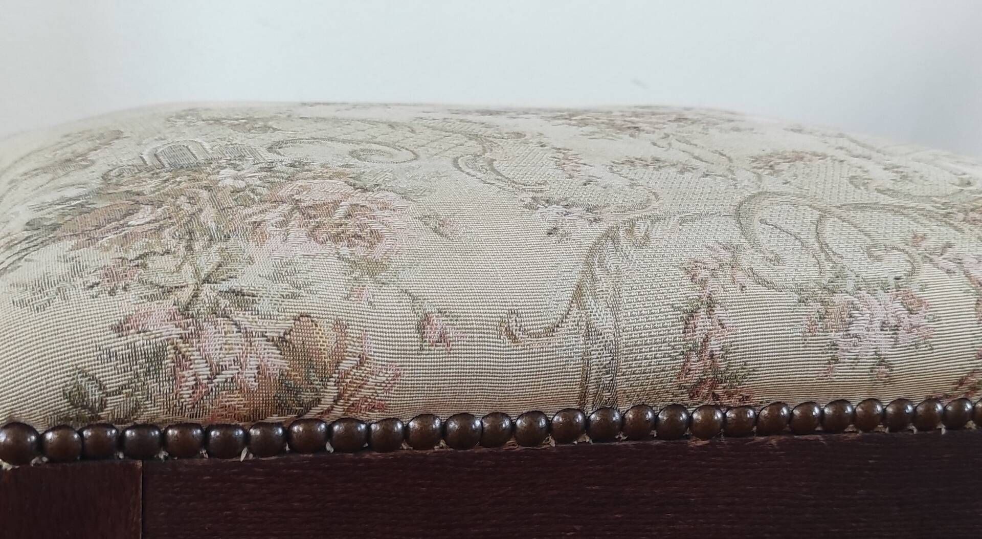 Footrest, vintage stool in solid oak with floral upholstery.