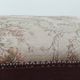 Footrest, vintage stool in solid oak with floral upholstery.