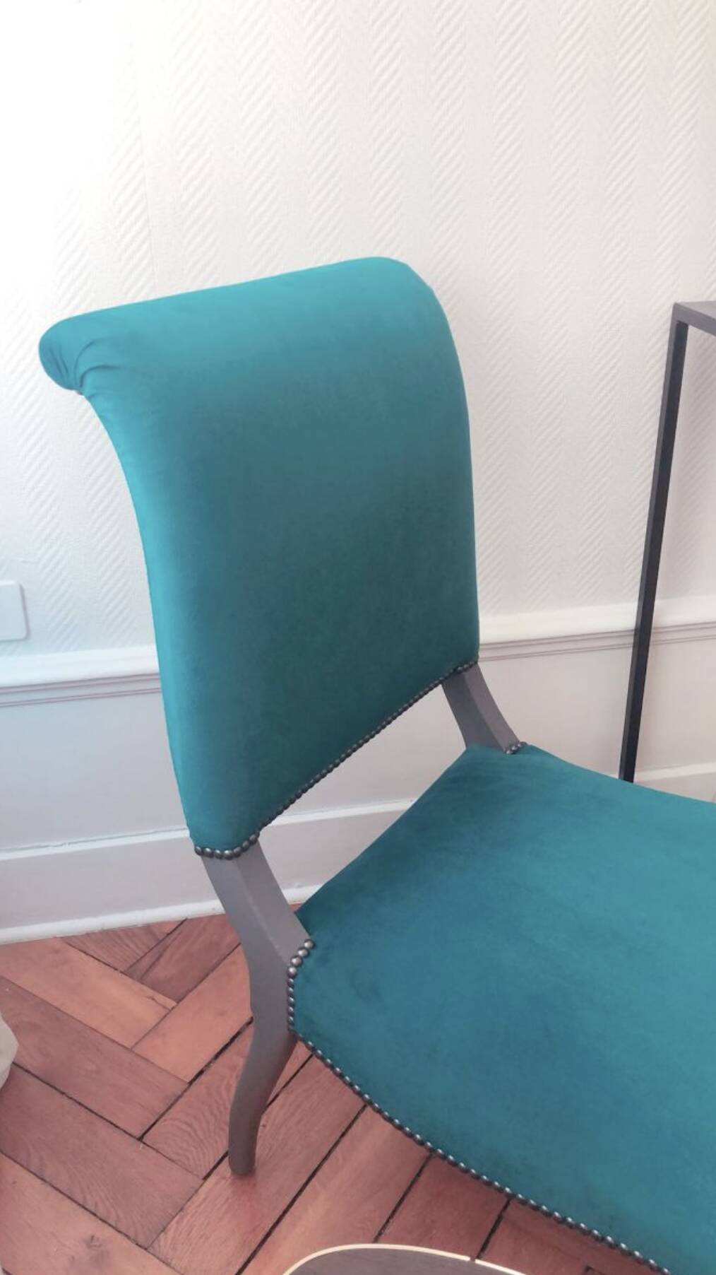 Velvet and studded armchair