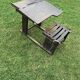 Brown painted wooden school desk for children, vintage 1920s set, slatted seat and storage.