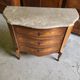 Curved chest of drawers in rosewood and marble marquetry