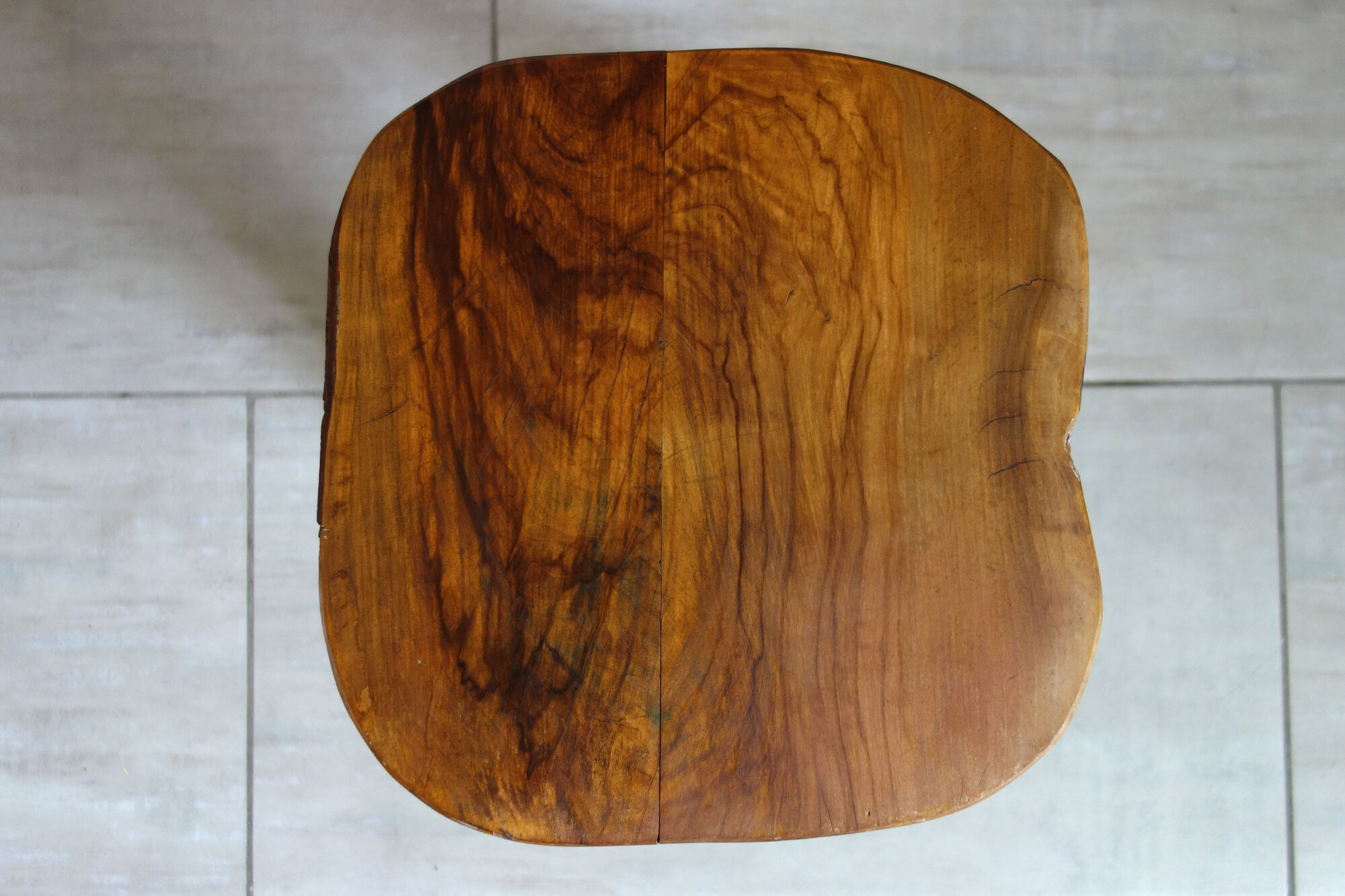 Brutalist stool made of olive wood