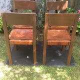 Series of 4 vintage chairs with elm base and brown leather seats in the Pierre Chapo way.