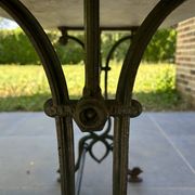 Art Nouveau cast iron and marble bistro table.