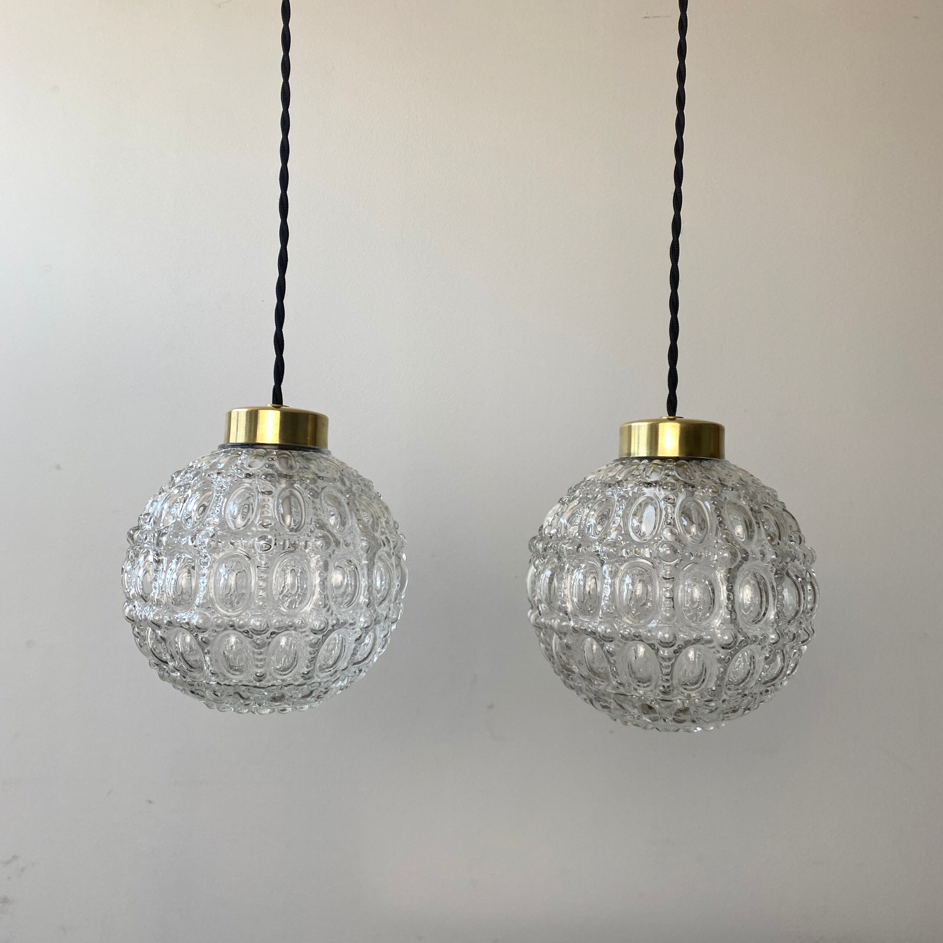 Pair of round hanging lamps in vintage glass