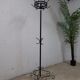 vintage black coat rack with 'golden' accent