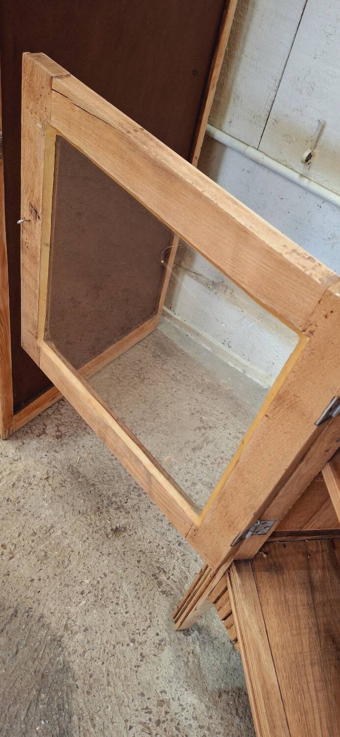 Old glass sideboard on legs